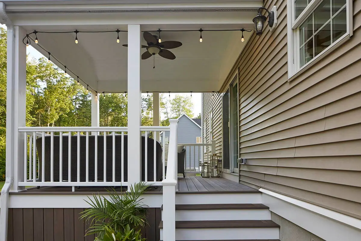 TimberTech porch floor under a covered porch with ceiling fan