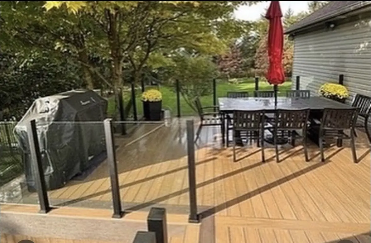 Frameless glass railing with posts