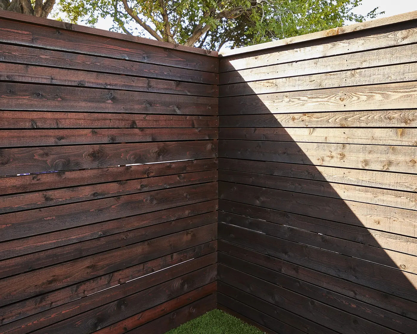 Wood fence rails and post-and-rail - stained cedar wood fence installed, Wood Defender