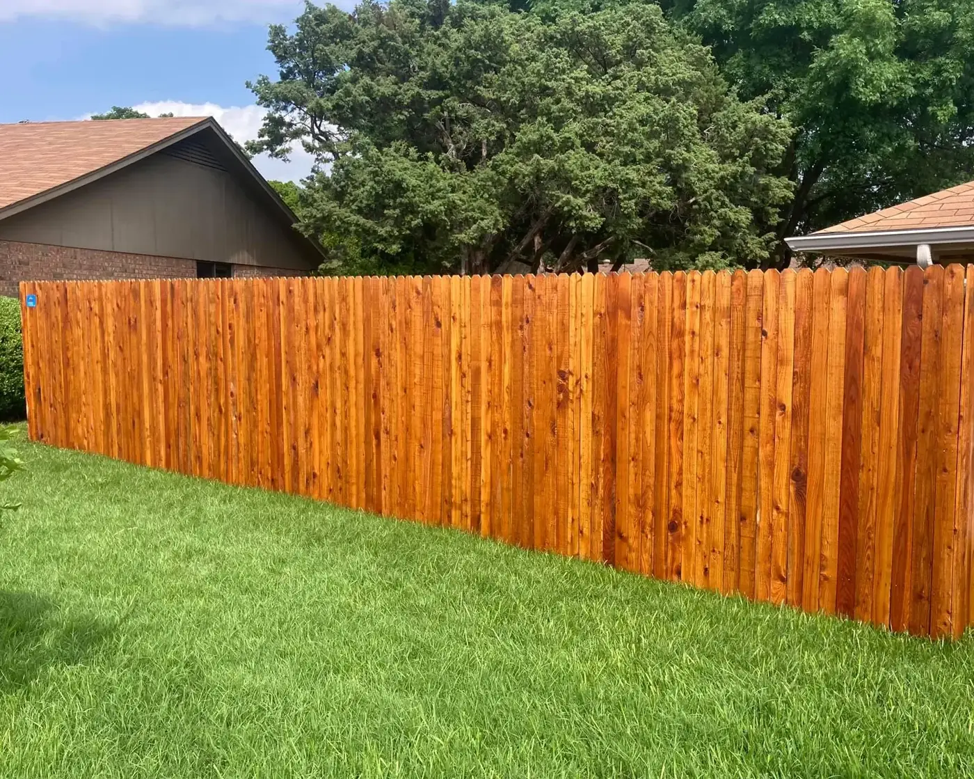 Wood fence boards and pickets - stained cedar wood fence installed, Wood Defender