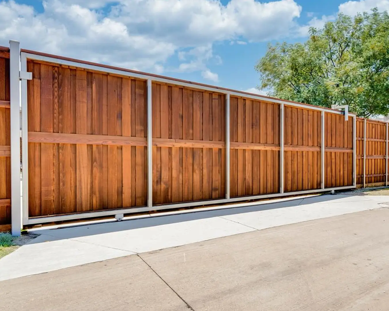 Wood fence posts - stained cedar wood fence installed, Wood Defender